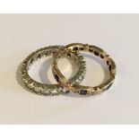 A 9ct gold diamond and sapphire eternity ring (size N) along with one other (size O)