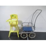 A dolls high chair and push chair