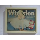 A framed Marilyn Monroe advertising print for Winston cigarettes