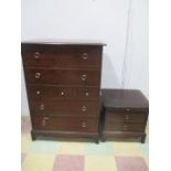 A Stag chest of seven drawers along with a bedside cabinet