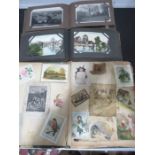 Two postcard albums along with a scrap book- postcards mainly foreign, but with several Lyme Regis