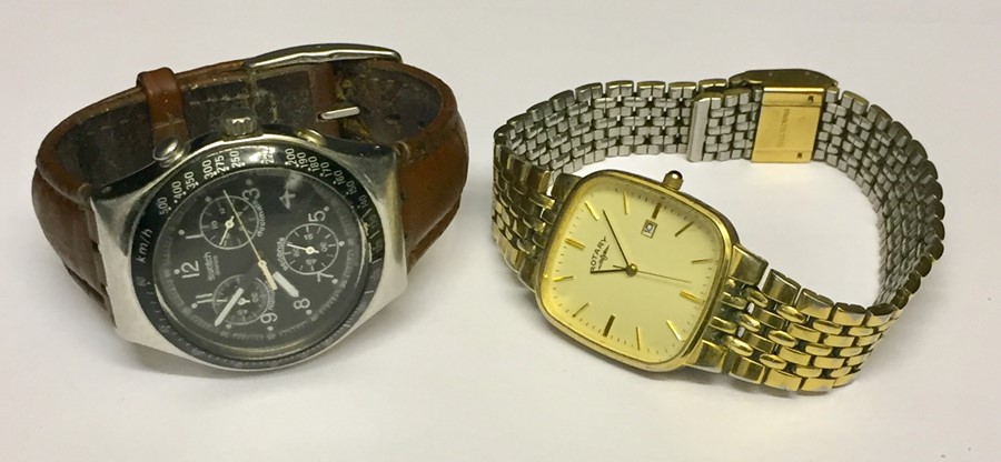 A Swatch wristwatch along with a Rotary watch.