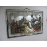 A vintage mirror with cut decoration