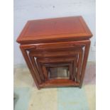 A Chinese hardwood nest of four tables