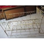 A Victorian wrought iron cot