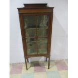 An Edwardian inlaid display cabinet