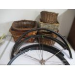 A quantity of vintage bicycle baskets and mudguards