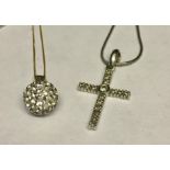 A 9ct white gold chain and cross set with diamonds along with one other pendant. Total weight 4.5g