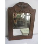 A copper Arts & Crafts mirror