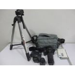 A Minolta 7000 AF camera with Minolta 70-210mm len and one other, tri-pod etc
