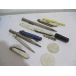 Two silver propelling pencils along with two silver bladed pen knives etc