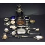 Hallmarked silver spoons, napkin ring and small cup along with various silver plated items.