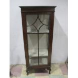 An Edwardian display cabinet