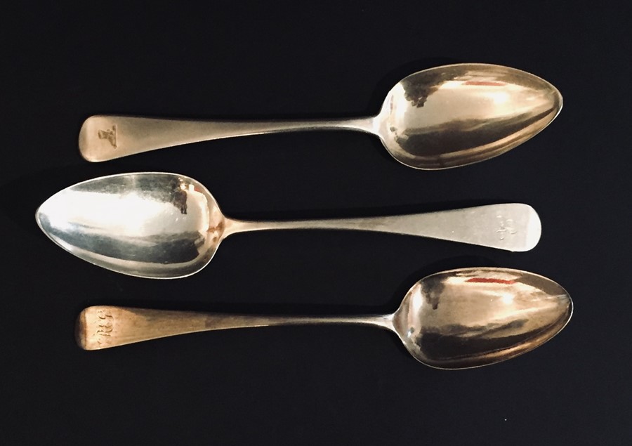 Three hallmarked silver serving spoons.Total weight 180g