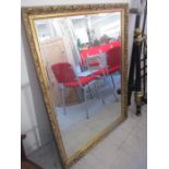 A large gilt mirror