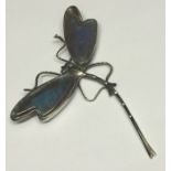 An unmarked SCM dragonfly brooch decorated with butterfly wings.