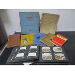 A small collection of manuals, instruction booklets along with cigarette cards of Guernsey etc.