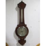 A Victorian mahogany barometer by Dollond