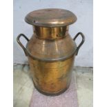 A copper Horlicks Dairies milk churn