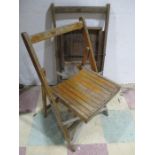 A pair of vintage fold up chairs by Grays Ltd