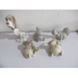 A selection of five boxed Nao comedic animal figurines.