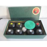 A boxed set of B&A indoor carpet bowls