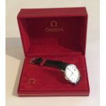 An Omega stainless steel watch in box