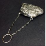 A hallmarked silver purse.