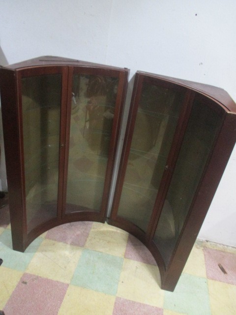 A pair of concave corner wall hanging shop display cabinets