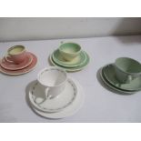 Three Susie Cooper cup and saucer trios along with a Spode trio
