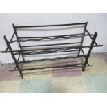 A small cast iron wine rack