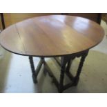 An oak gate leg table