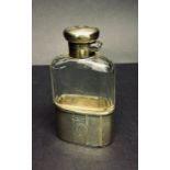 A hallmarked silver gilt hip flask. London 1909.