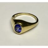 A 9ct gold gents ring set with Tanzanite