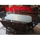 A part painted teak garden table and six chairs