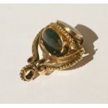 A 9ct gold swivel fob set with onyx, malachite and moss agate