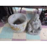 A garden Buddha along with a garden pot