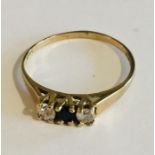 A 9ct gold diamond and sapphire ring, Size N