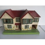 A vintage Tri Ang dolls house