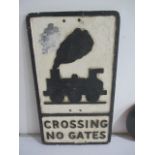 An original cast iron Railways crossing sign