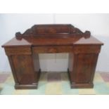 A mahogany Regency twin pedestal sideboard