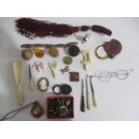 A collection of small interesting items including miniature figures of soldiers, costume