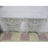 A pair of cast iron table legs/bases