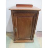 A mahogany pot cupboard