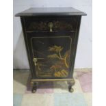 A Waring & Gillow Chinoiserie bedside cabinet decorated in gilt with typical scenes