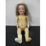 A vintage Heubach Koppelsdorf 3428 German bisque headed doll