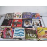 A collection of 7" vinyl singles including Prince, Donna Summer, Paul Young etc