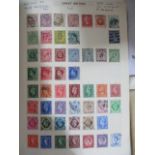 Two albums of worldwide stamps along with some loose