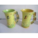 Two Burleigh Ware jugs, the handles decorated with butterflies, 20.5 cm height