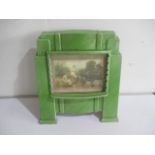 A French 1930's enamelled fire which has been converted to a picture frame